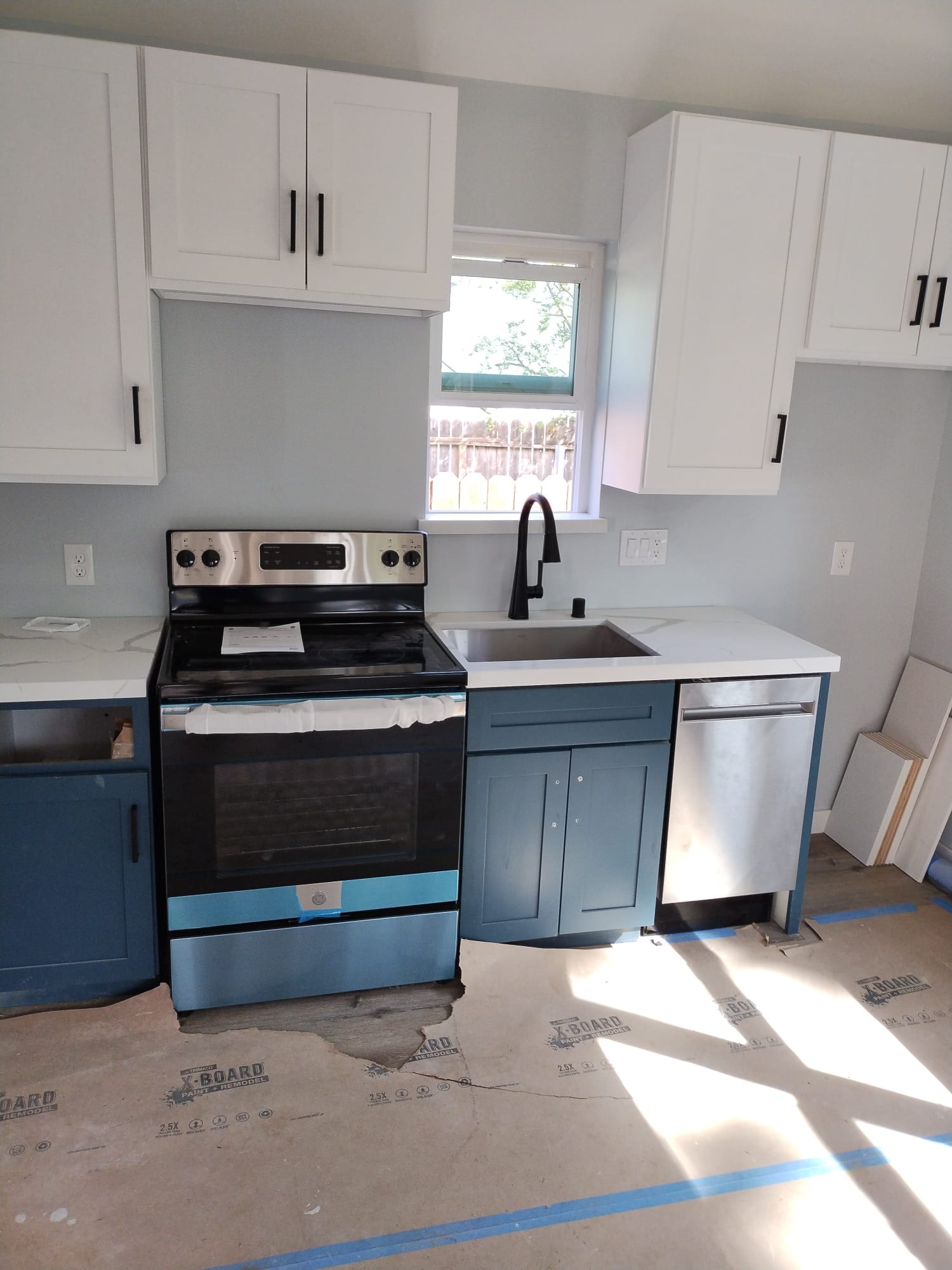 47th St. ADU kitchen with cabinets and countertops installed