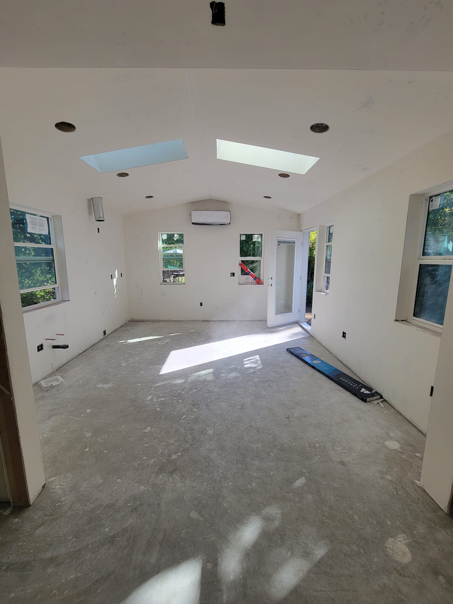 48th St. ADU interior with skylights and vaulted ceiling
