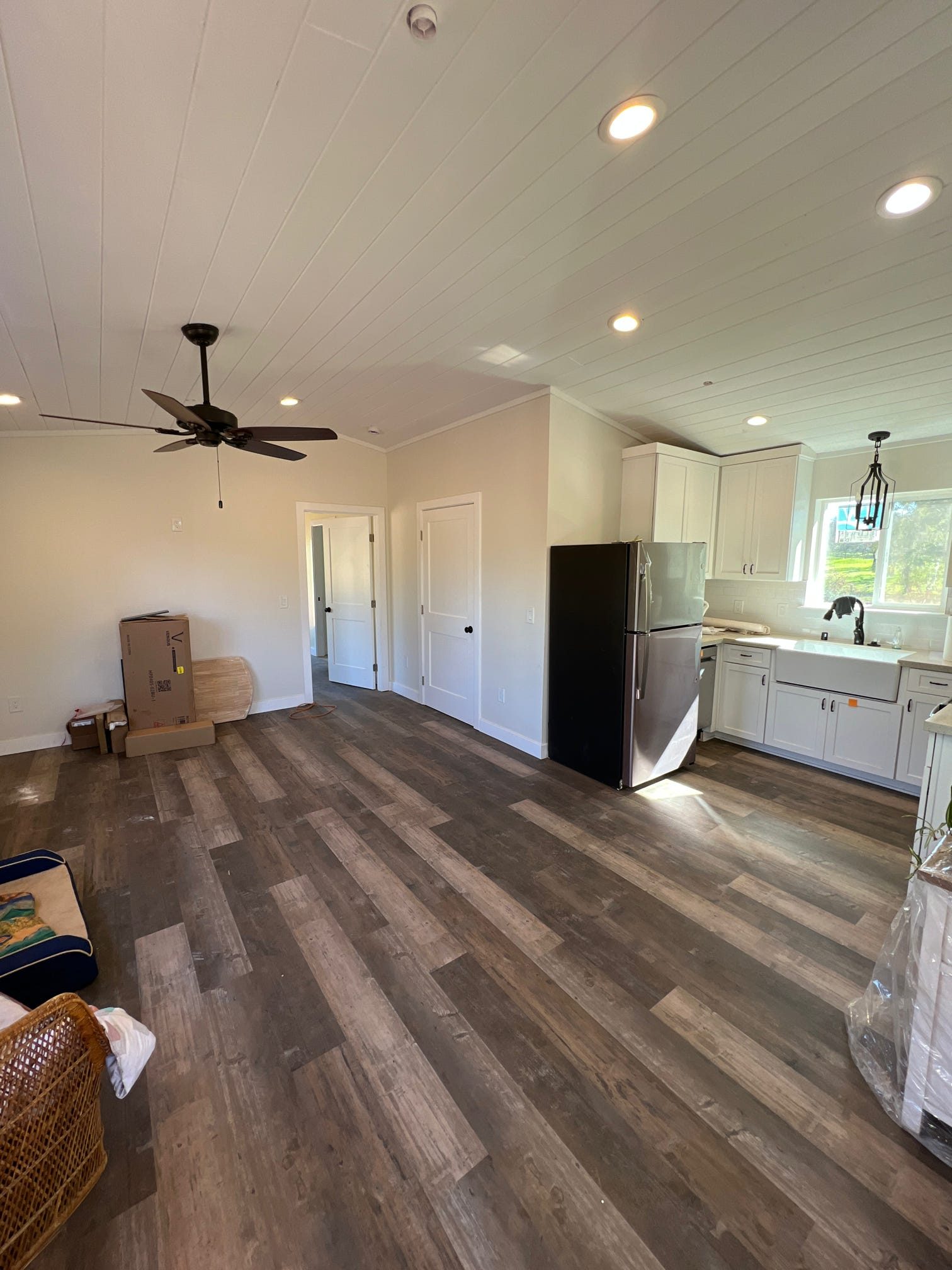ADU living area with wood-look flooring