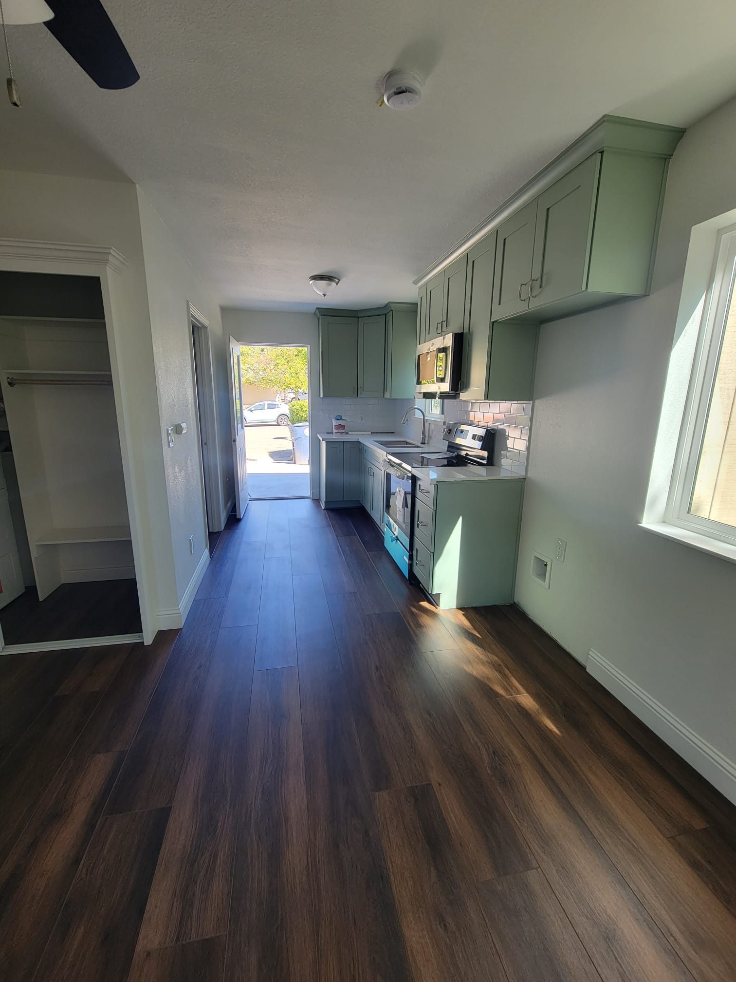 ADU hallway with wood-look flooring
