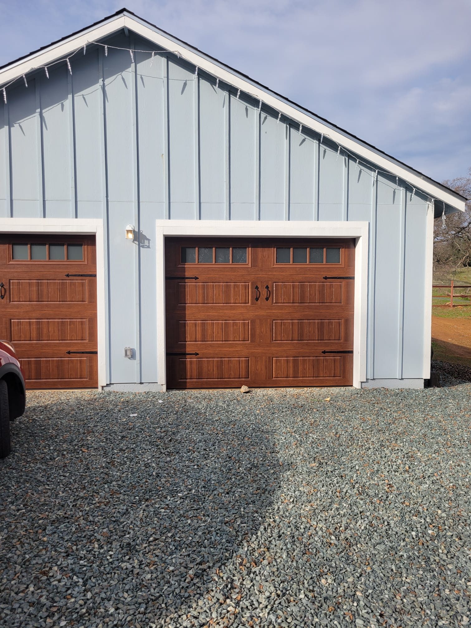 ADU-style garage with wood-look carriage doors