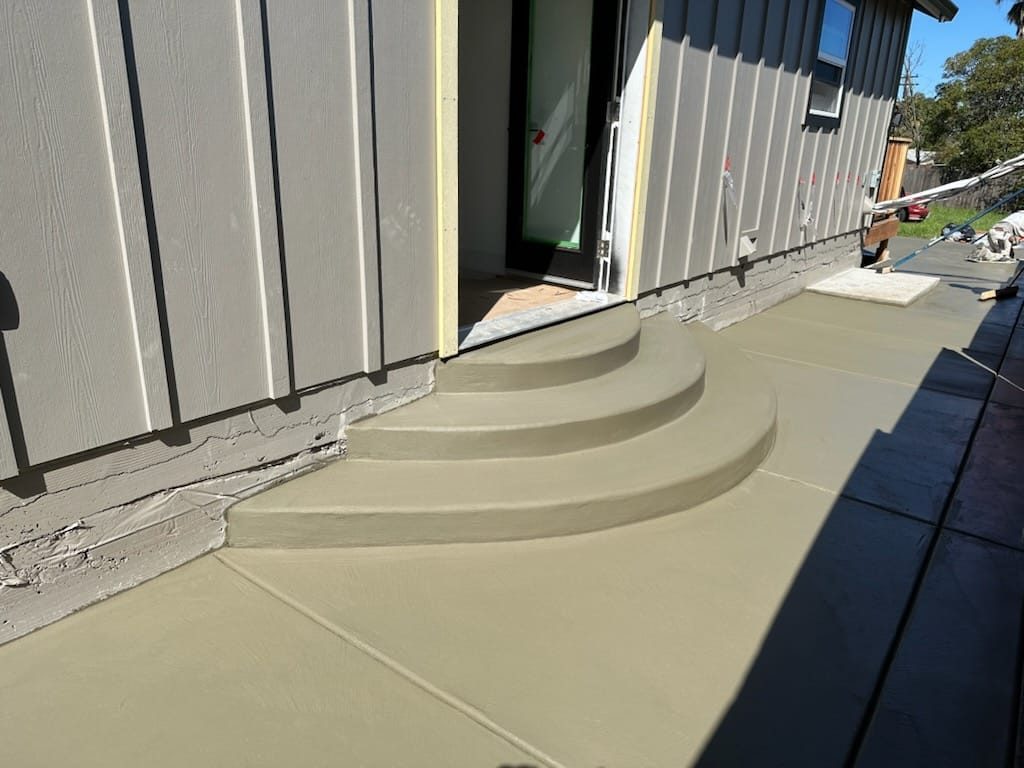 ADU entry steps and board-and-batten siding