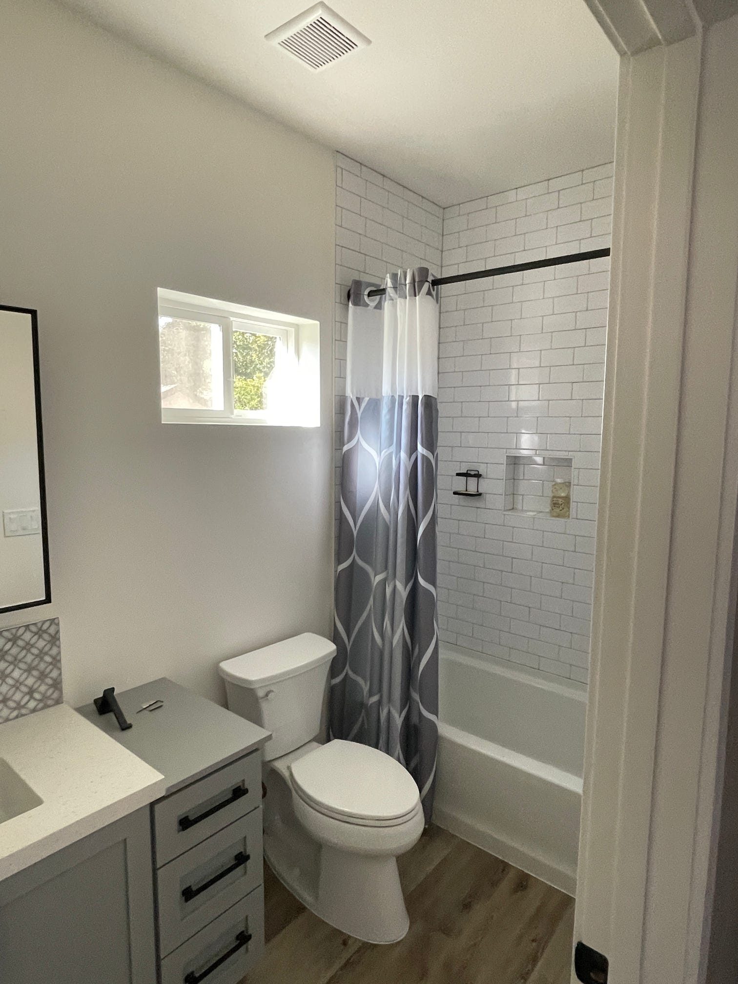 ADU bathroom with tub/shower combo