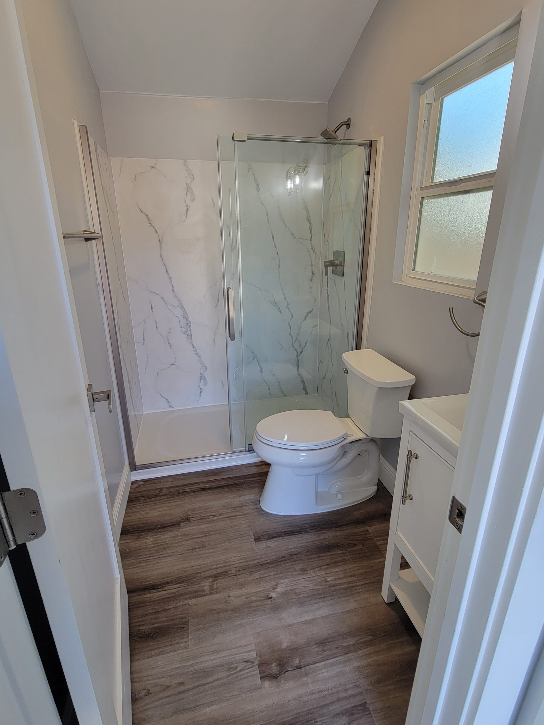 ADU bathroom with tiled glass shower