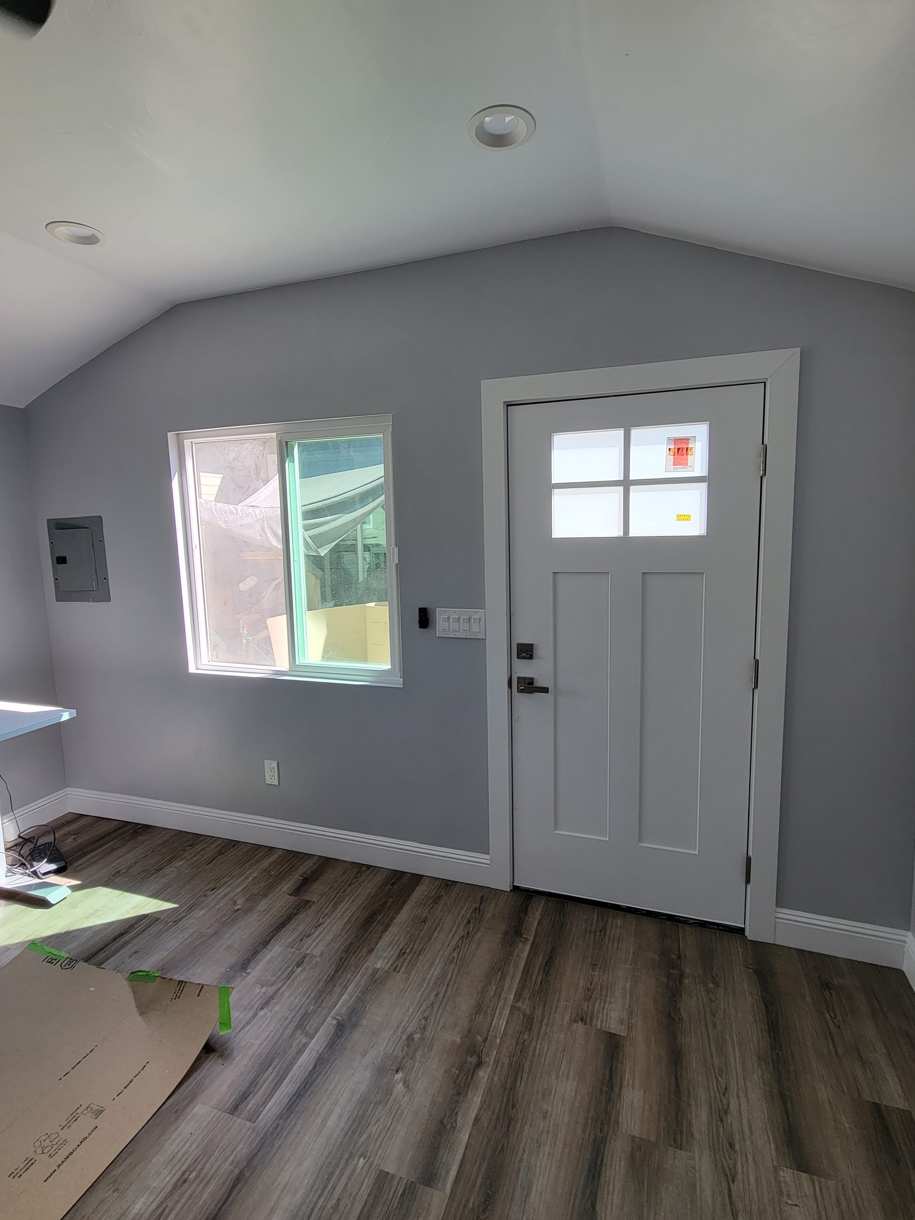 ADU entry with craftsman-style door