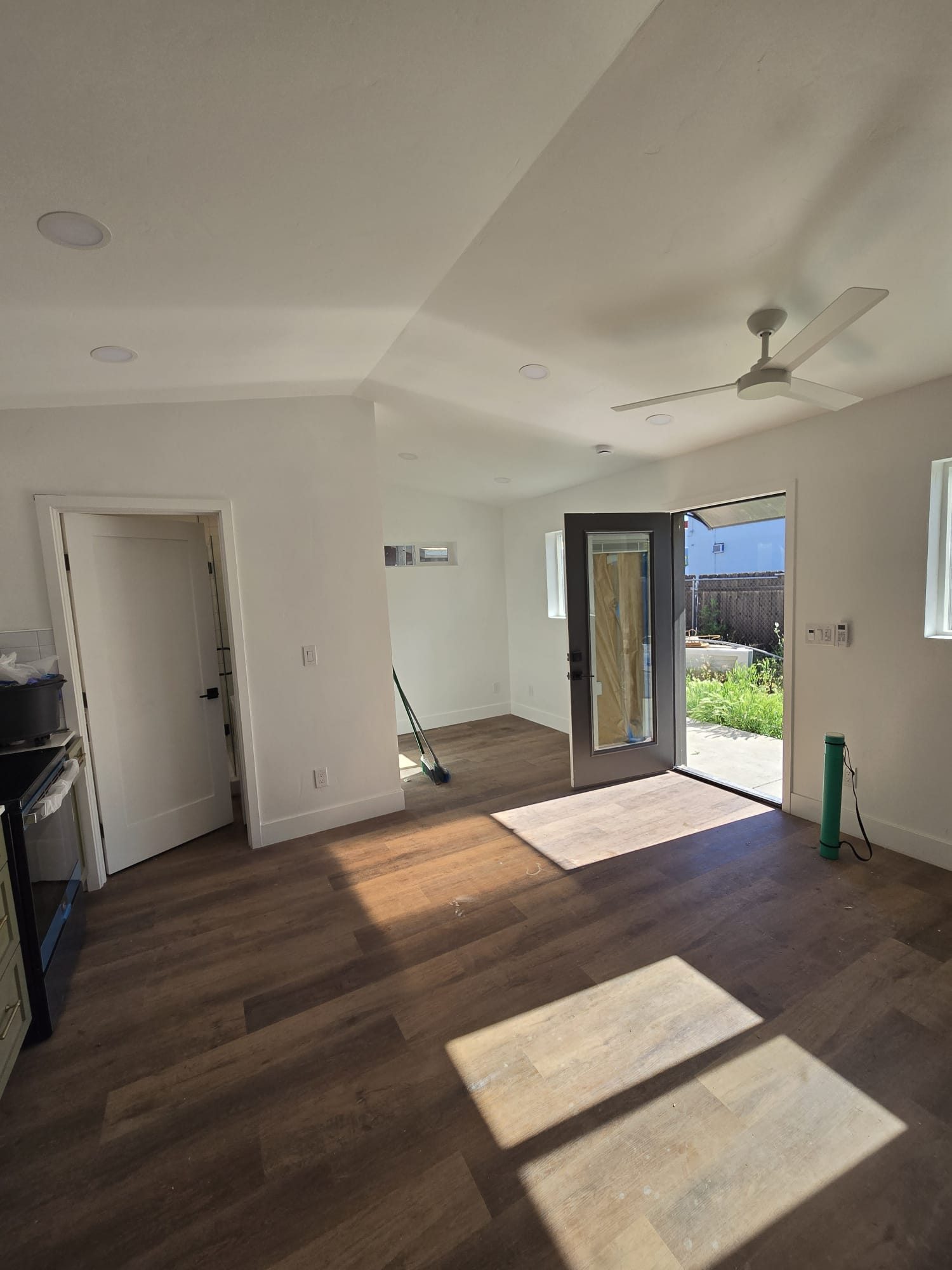 ADU living area with wood-look flooring
