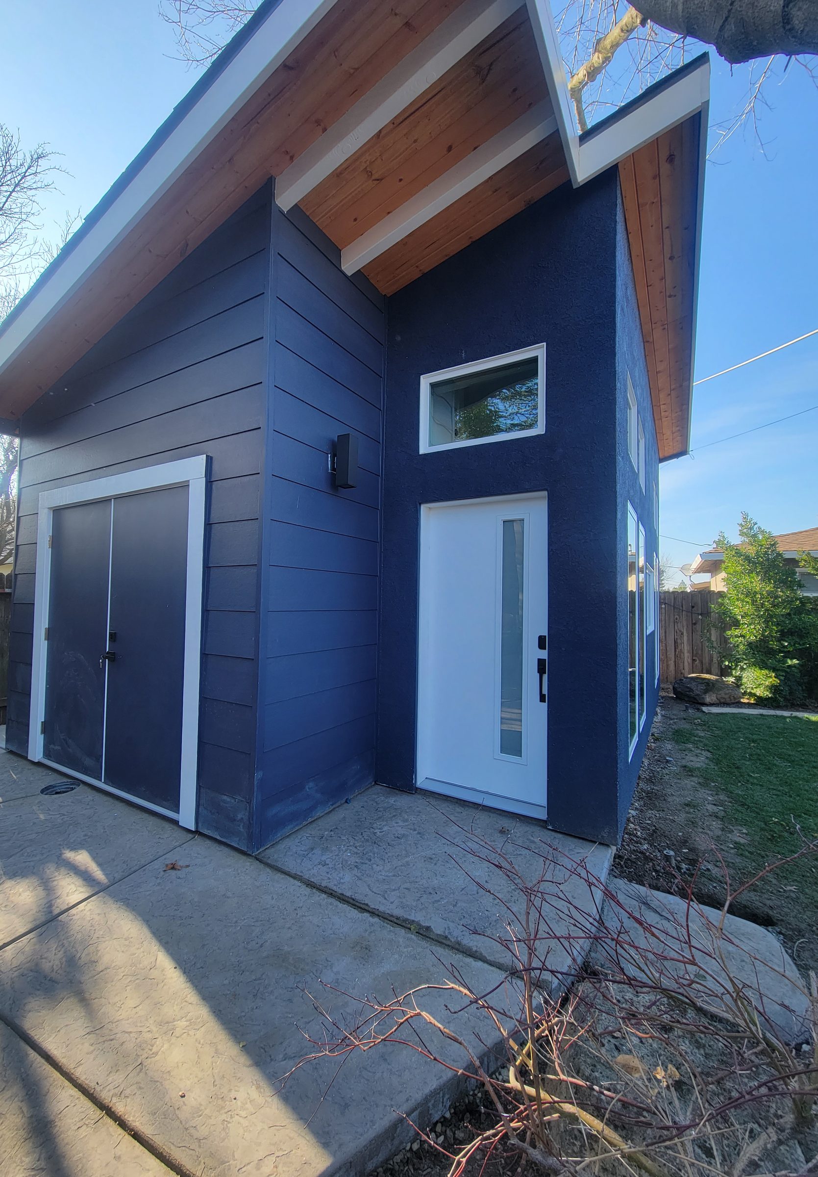Modern ADU exterior, low angle showing roofline
