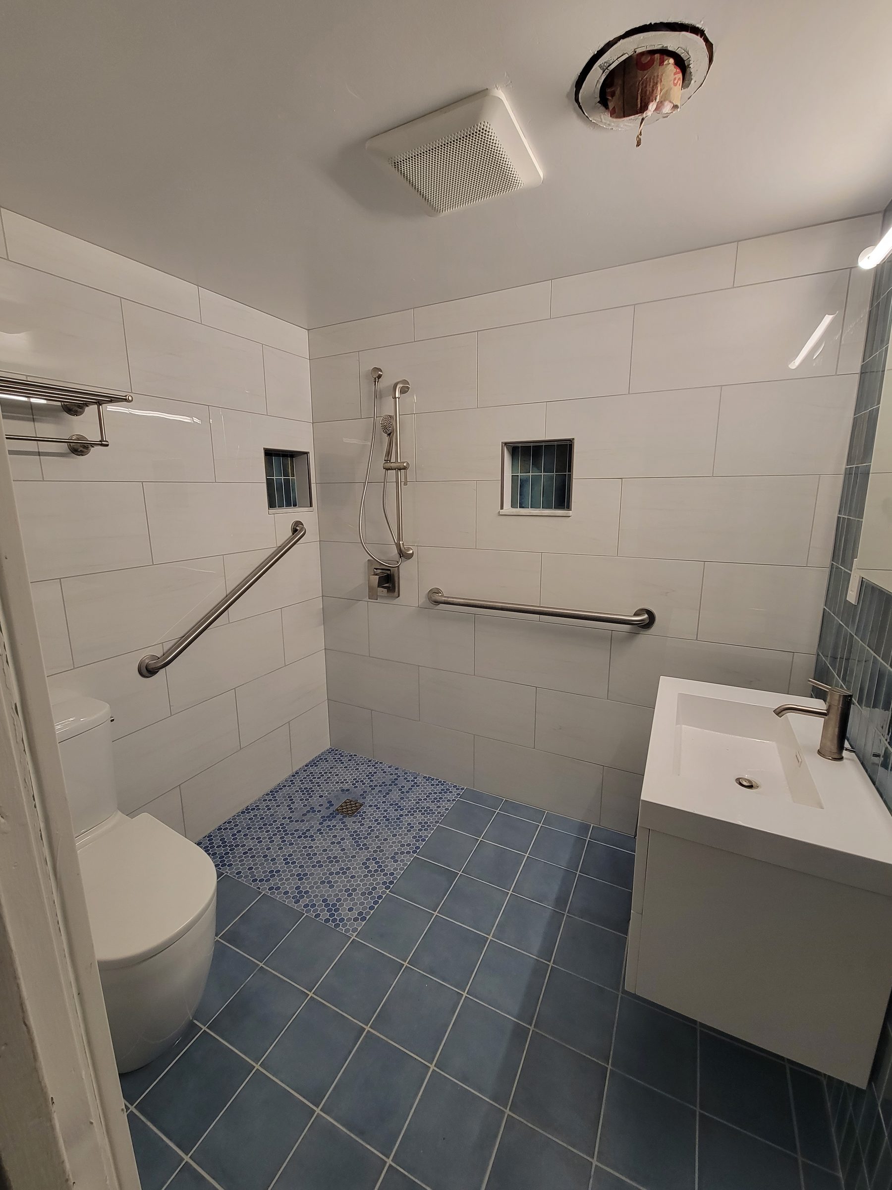 Accessible wet room with grab bars
