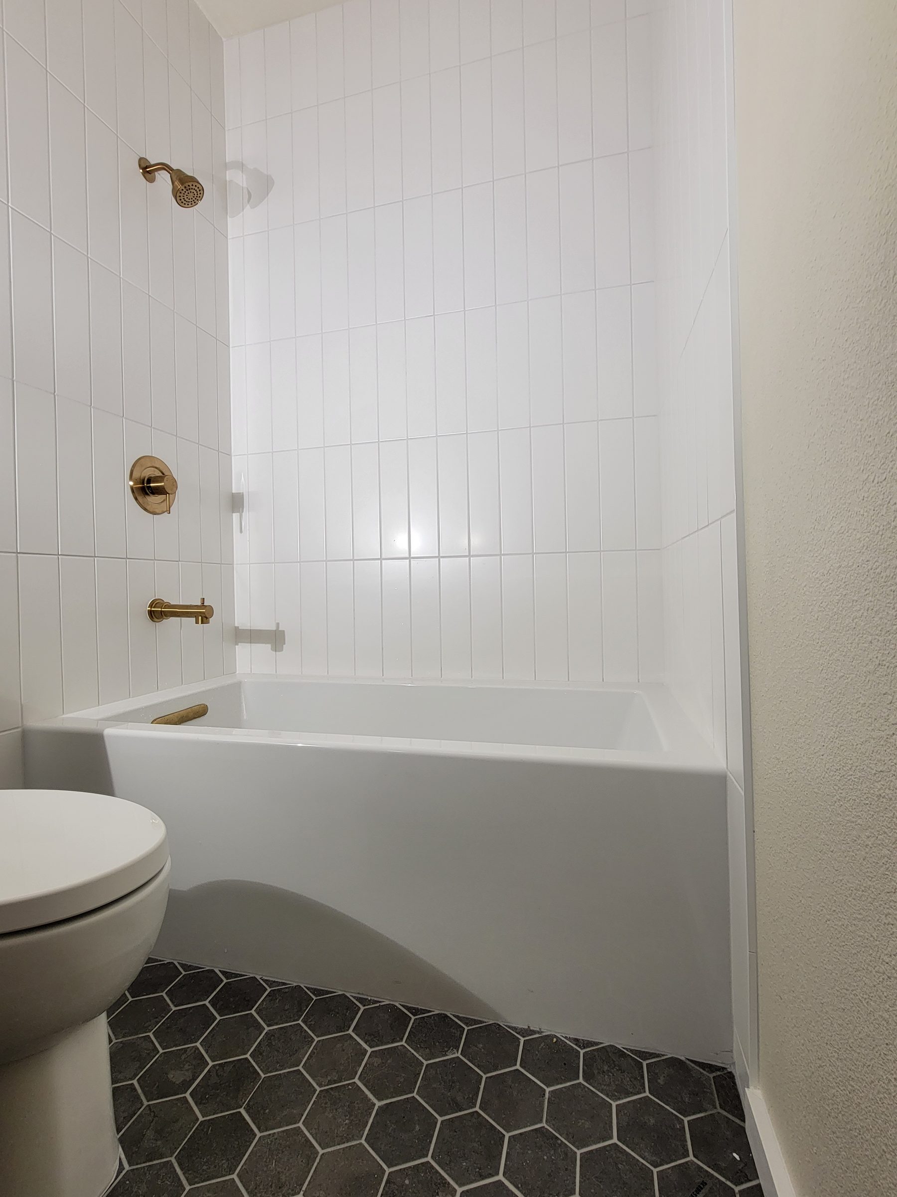 Glass shower enclosure