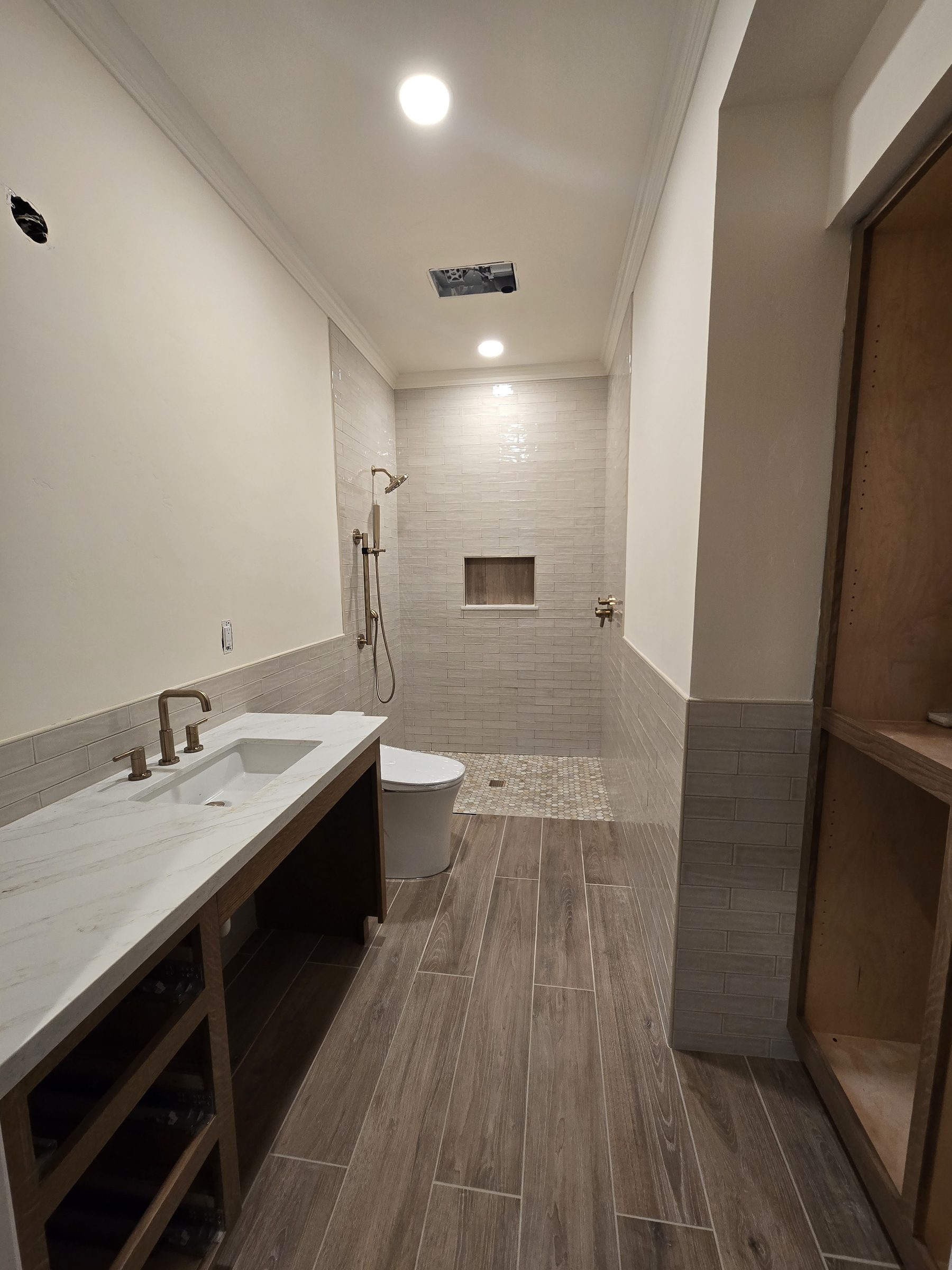 Bathroom vanity and toilet