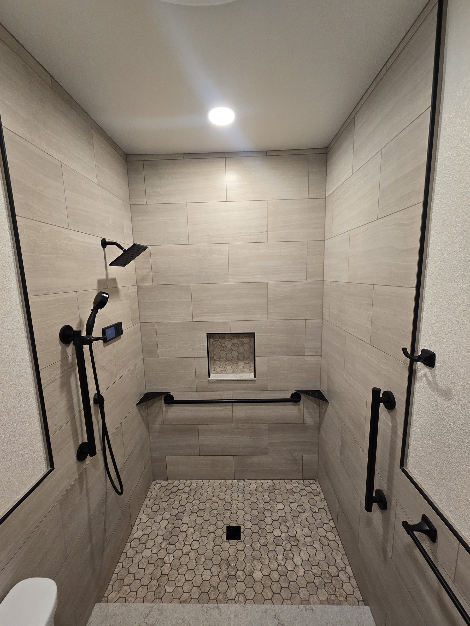 Curbless shower, alternate angle with grab bars