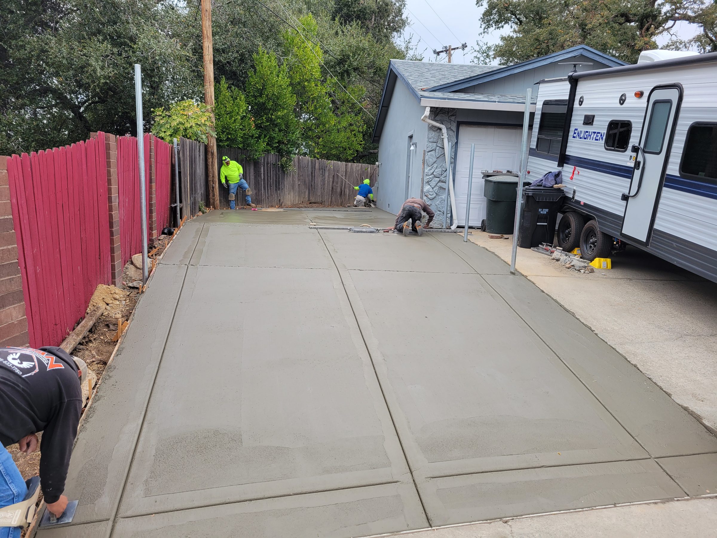 Concrete driveway and fence