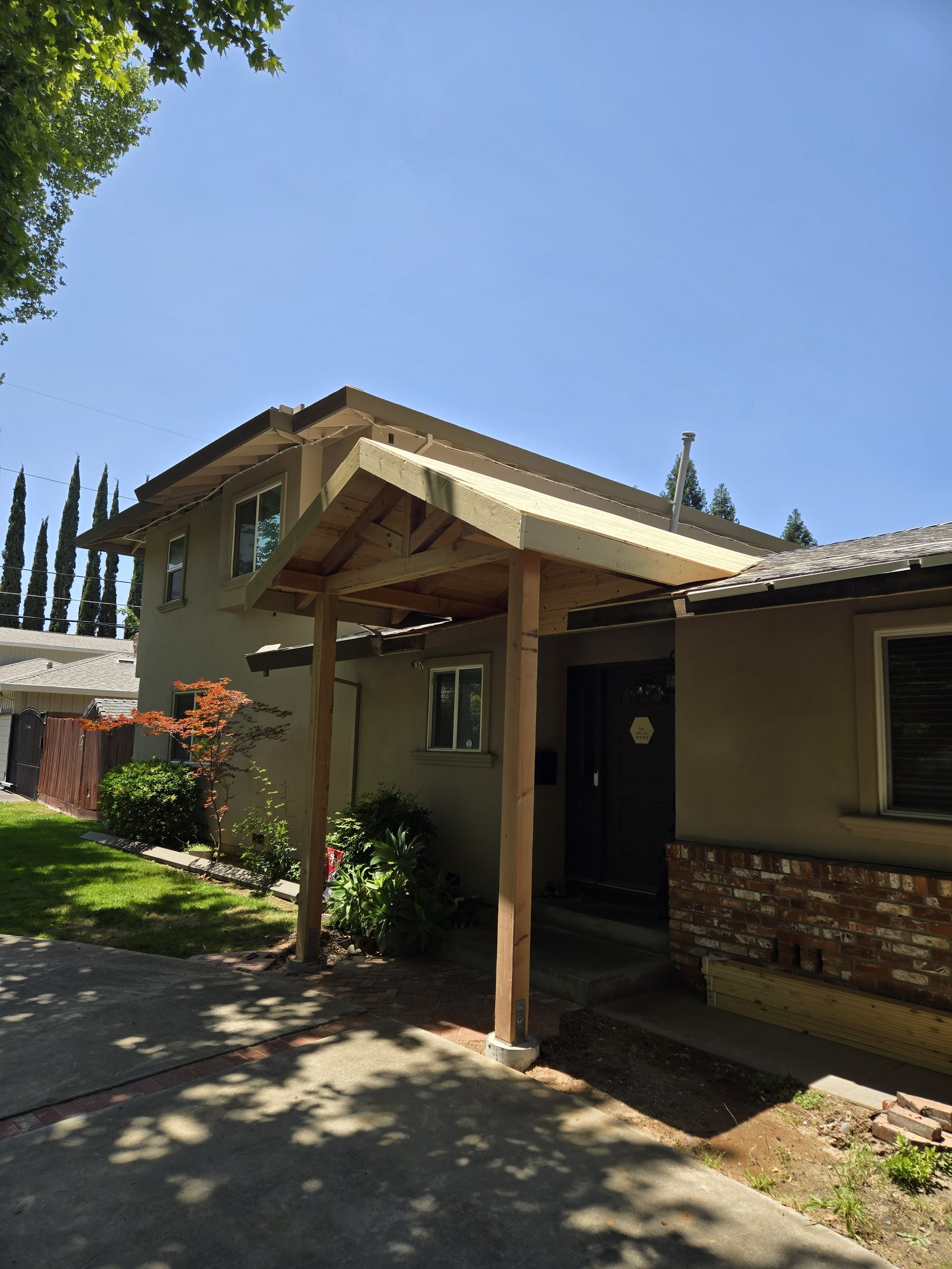 Front entry porch addition seen from the side