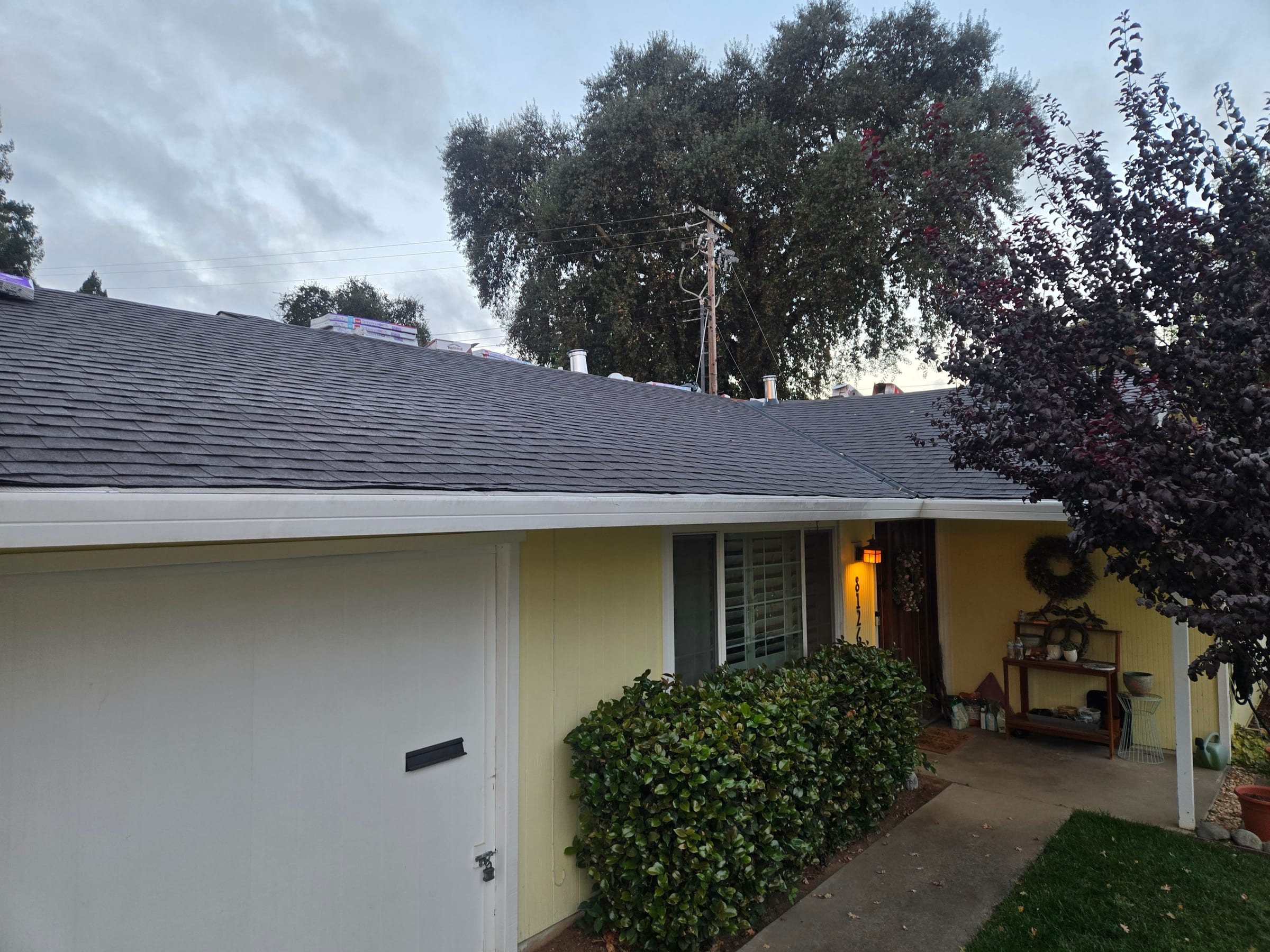 Finished shingle roofline over the home's covered front entry