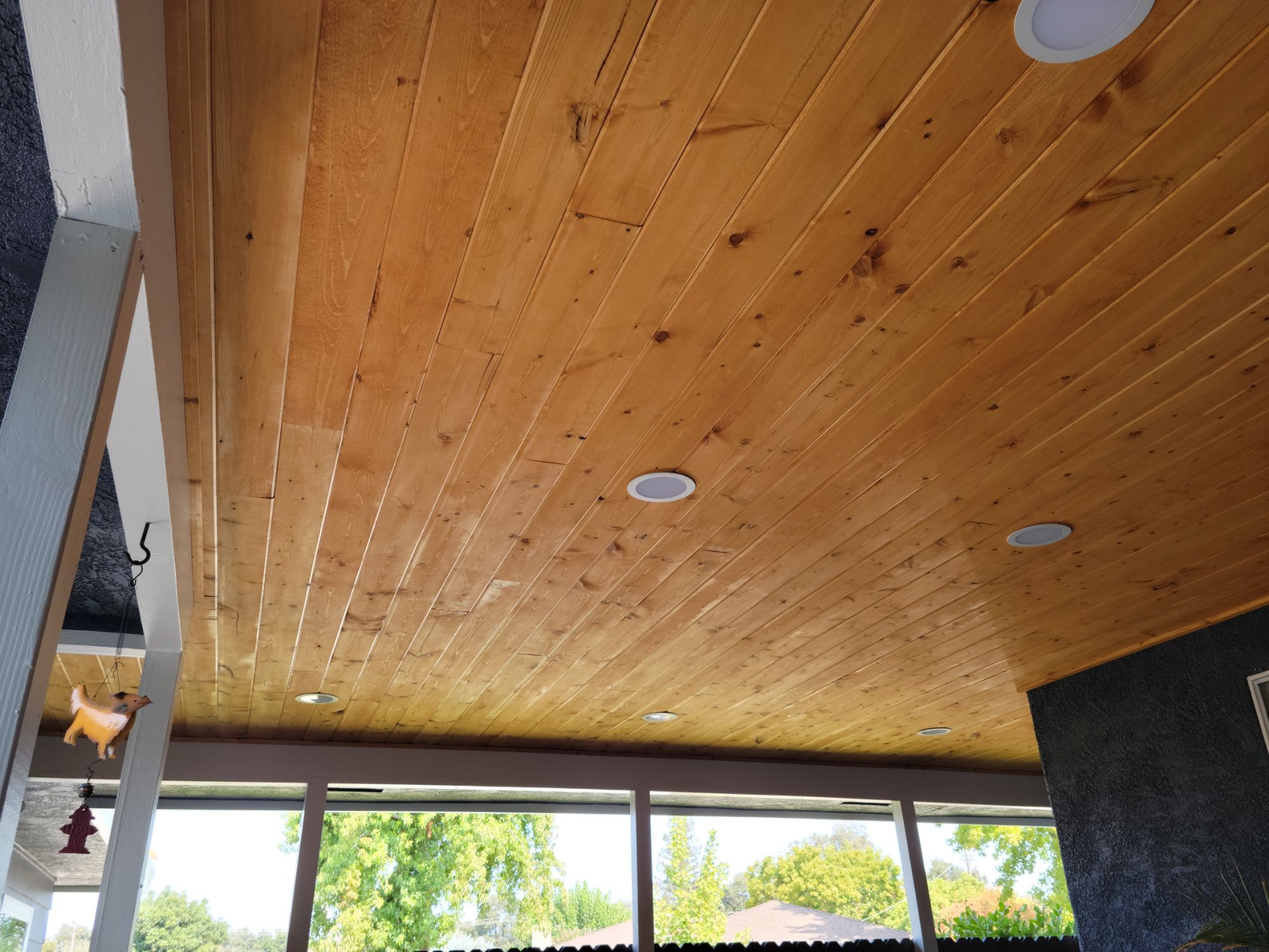 Cedar soffit ceiling, wide angle showing recessed lighting layout