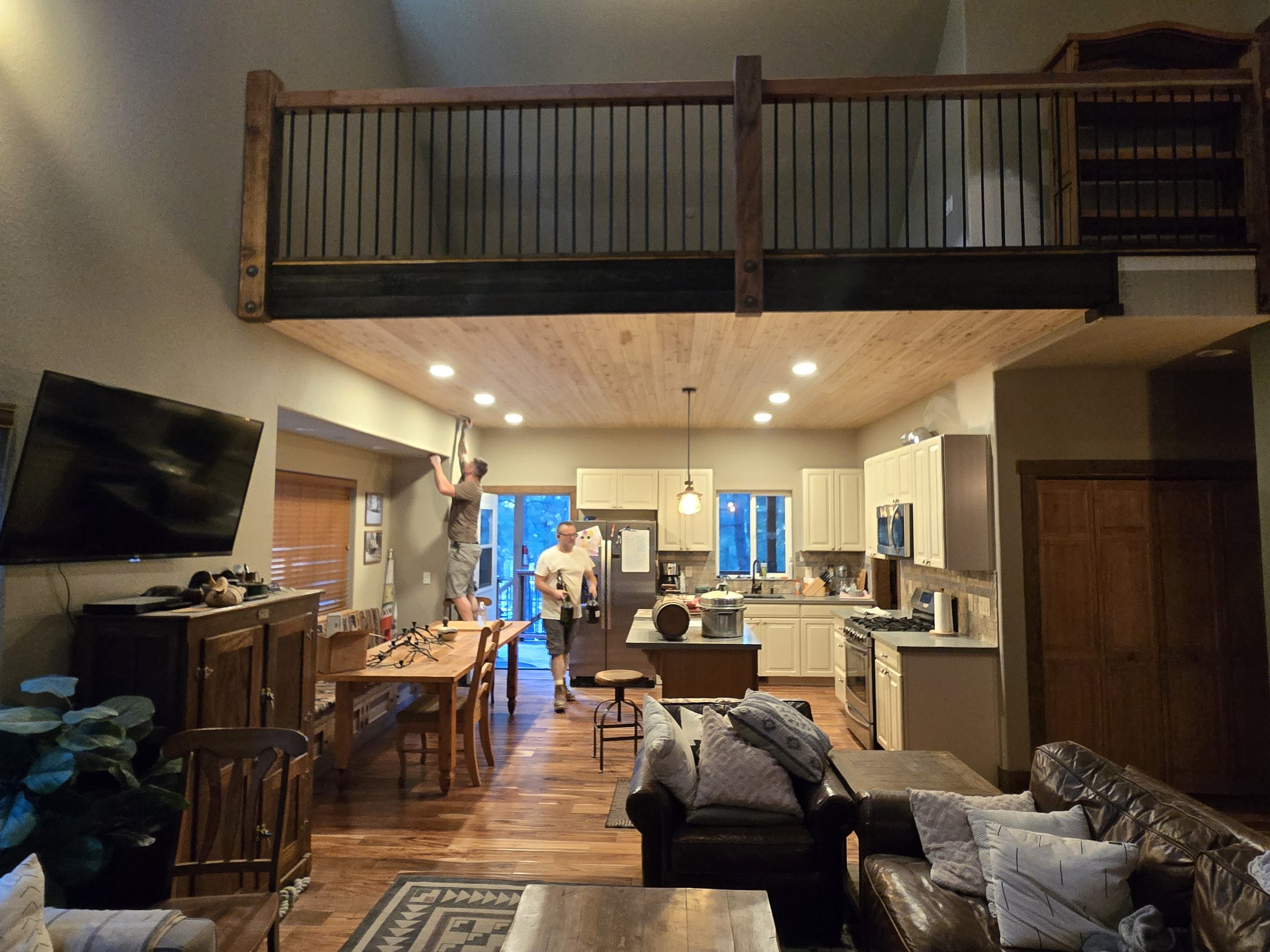 Loft with railing overlook